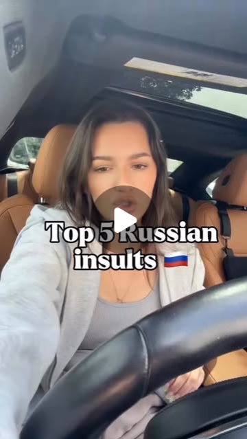Cover: Katie in her car, text reads Top 5 Russian insults